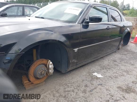 2006 Chrysler 300 C SRT-8 with VIN 2C3LA73W36H450317, listed as a IAAI auction lot 43148082 with 110,634 mi miles and . Bid and sale history available at DreamBid. Image 13.