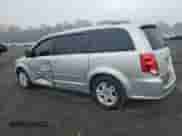 2012 Dodge Grand Caravan Crew with VIN 2C4RDGDGXCR377702, listed as a Copart auction lot 71827965 with 221,594 mi miles and Salvage title. Bid and sale history available at DreamBid. Image 2.