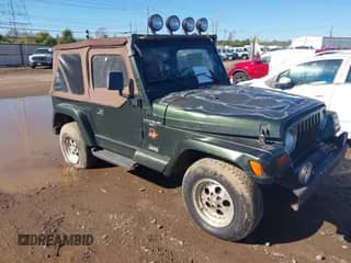 1997 Jeep Wrangler Sahara with VIN 1J4FY49S1VP505083, listed as a IAAI auction lot 43472105 with 202,962 mi miles and . Bid and sale history available at DreamBid. Image 1.