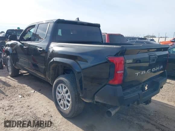 2024 Toyota Tacoma SR with VIN 3TYKD5HN5RT003937, listed as a IAAI auction lot 41339802 with 13,117 mi miles and . Bid and sale history available at DreamBid. Image 3.