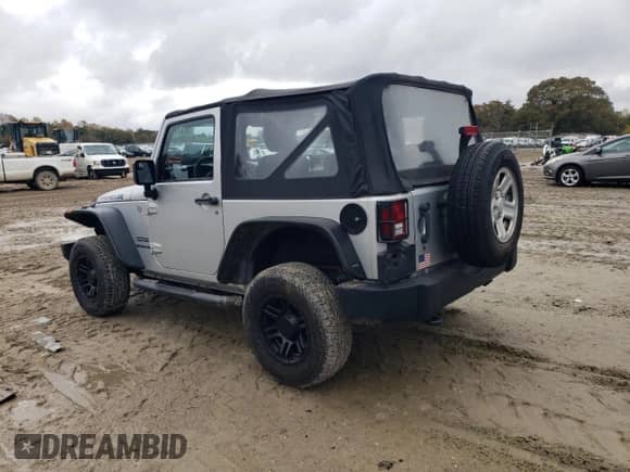 2012 Jeep Wrangler Sport with VIN 1C4AJWAG2CL117209, listed as a Copart auction lot 90579055 with 48,119 mi miles and Clean title. Bid and sale history available at DreamBid. Image 2.