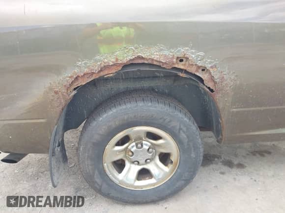 2012 Ram 1500 ST z VIN 3C6JD6DP0CG121895, wystawiony jako IAAI lot #43330426 z przebiegiem 157 340 mil mil oraz . Historia ofert i sprzedaży dostępna na DreamBid. Obrazek 6.