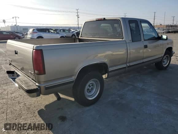 1998 GMC Sierra 1500 z VIN 1GTEC19M7WR513663, wystawiony jako Copart lot #86165904 z przebiegiem 147 608 mil mil oraz Czysty tytuł • Clean title. Historia ofert i sprzedaży dostępna na DreamBid. Obrazek 3.