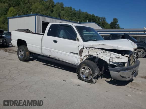 2002 Dodge 2500 with VIN 3B7KF23Z62M242224, listed as a Copart auction lot 71925915 with 219,590 mi miles and Salvage title. Bid and sale history available at DreamBid. Image 4.