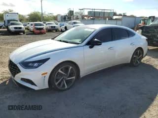 2021 Hyundai Sonata SEL Plus с VIN 5NPEJ4J21MH081383, выставлен на аукционе Copart как лот 47407554 с пробегом 54 149 миль миль и Списание • Salvage title. История ставок и продаж доступна на DreamBid. Изображение 1.