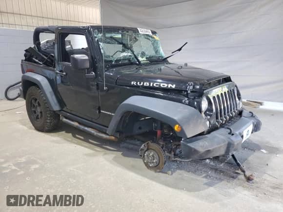 2016 Jeep Wrangler Rubicon with VIN 1C4BJWCG5GL178478, listed as a Copart auction lot 65230405 with Not provided miles and Salvage title. Bid and sale history available at DreamBid. Image 4.