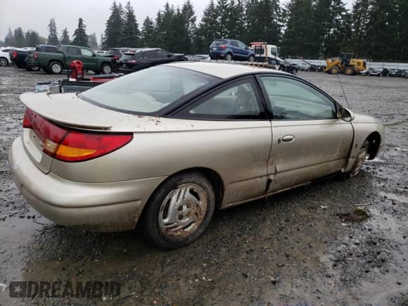 1997 Saturn SC с VIN 1G8ZG1279VZ308316, выставлен на аукционе Copart как лот 87381914 с пробегом 93 654 миль миль и Списание • Salvage title. История ставок и продаж доступна на DreamBid. Изображение 3.