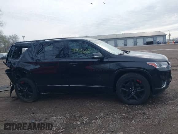 2020 Chevrolet Traverse Premier with VIN 1GNERKKW4LJ106546, listed as a IAAI auction lot 41953652 with 101,884 mi miles and . Bid and sale history available at DreamBid. Image 13.