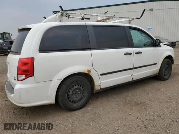 2011 Dodge Caravan with VIN 2D4JN1AG4BR722929, listed as a Copart auction lot 64454644 with 250,240 mi miles and Salvage title. Bid and sale history available at DreamBid. Image 3.