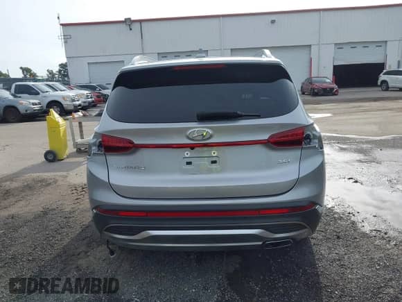 2021 Hyundai Santa Fe Limited with VIN 5NMS44AL2MH344965, listed as a IAAI auction lot 43247706 with 32,452 mi miles and . Bid and sale history available at DreamBid. Image 16.
