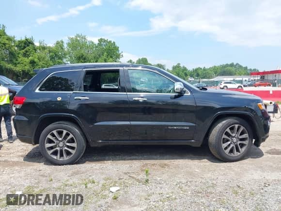 2017 Jeep Grand Cherokee Overland with VIN 1C4RJFCG7HC843414, listed as a IAAI auction lot 42394139 with 103,061 mi miles and . Bid and sale history available at DreamBid. Image 13.