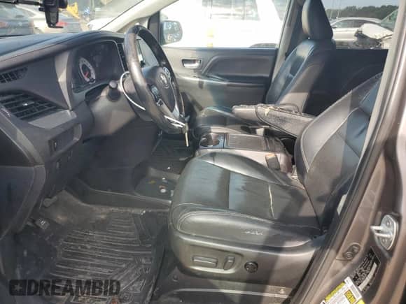 2017 Toyota Sienna SE with VIN 5TDXZ3DC9HS799277, listed as a Copart auction lot 71922145 with 344,940 mi miles and Salvage title. Bid and sale history available at DreamBid. Image 7.