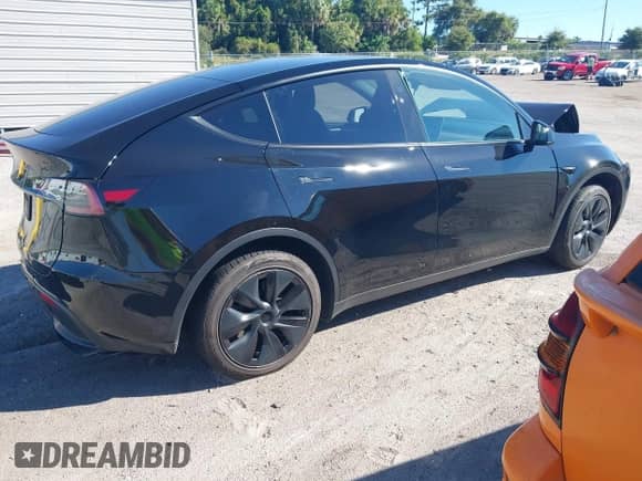 2024 Tesla Model Y с VIN 7SAYGDED8RF205908, выставлен на аукционе IAAI как лот 43289853 с пробегом 56 428 миль миль и . История ставок и продаж доступна на DreamBid. Изображение 13.