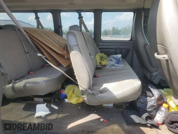 2011 Chevrolet Express Passenger 1LT с VIN 1GAZG1FG4B1120905, выставлен на аукционе Copart как лот 63797345 с пробегом 214 698 миль миль и Списание • Salvage title. История ставок и продаж доступна на DreamBid. Изображение 11.