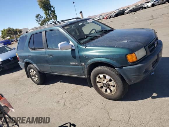 1998 Honda Passport LX with VIN 4S6CK58W6W4403286, listed as a Copart auction lot 70248784 with 84,627 mi miles and Clean title. Bid and sale history available at DreamBid. Image 4.
