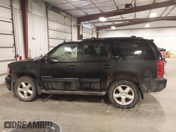 2007 Chevrolet Tahoe LTZ с VIN 1GNFK13007J219932, выставлен на аукционе IAAI как лот 41283023 с пробегом 188 451 миль миль и . История ставок и продаж доступна на DreamBid. Изображение 14.