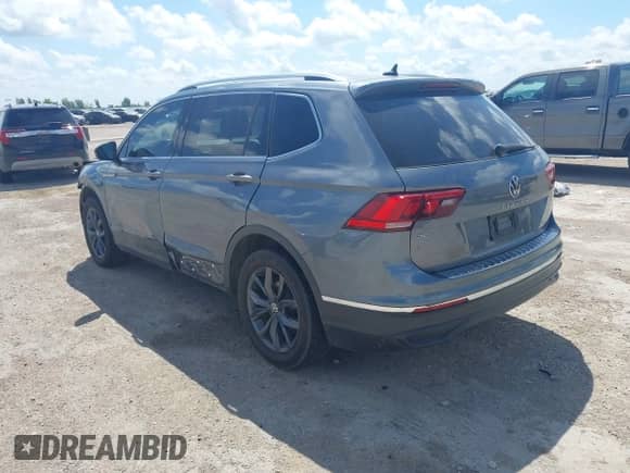 2022 Volkswagen Tiguan SE with VIN 3VV3B7AX5NM046716, listed as a IAAI auction lot 42548909 with 66,749 mi miles and . Bid and sale history available at DreamBid. Image 3.