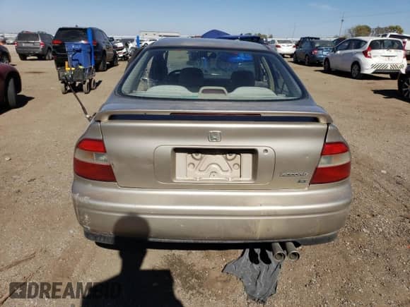 1994 Honda Accord LX z VIN 1HGCD5631RA137411, wystawiony jako Copart lot #76126484 z przebiegiem 212 681 mil mil oraz Szkoda całkowita • Salvage title. Historia ofert i sprzedaży dostępna na DreamBid. Obrazek 6.