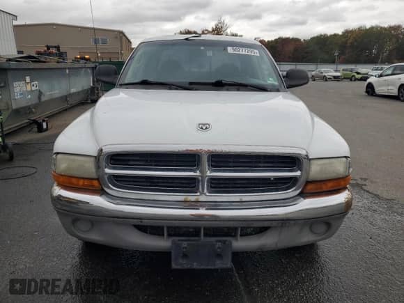 2001 Dodge Dakota Sport z VIN 1B7GL2AX21S155829, wystawiony jako Copart lot #90277295 z przebiegiem 231 414 mil mil oraz Czysty tytuł • Clean title. Historia ofert i sprzedaży dostępna na DreamBid. Obrazek 5.