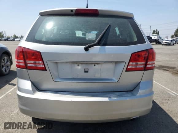 2014 Dodge Journey American Value with VIN 3C4PDCAB3ET171257, listed as a Copart auction lot 60751755 with 155,663 mi miles and Salvage title. Bid and sale history available at DreamBid. Image 6.