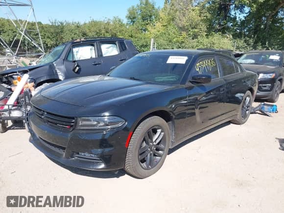 2019 Dodge Charger SXT with VIN 2C3CDXJG6KH743223, listed as a IAAI auction lot 43344866 with 55,661 mi miles and . Bid and sale history available at DreamBid. Image 2.
