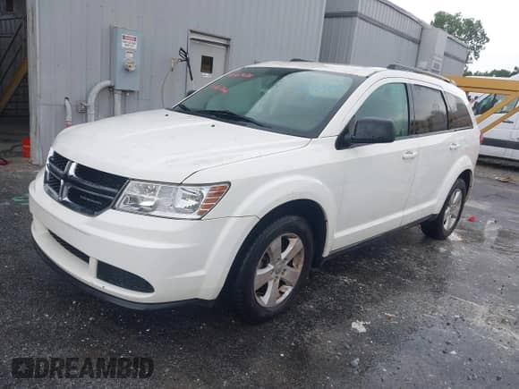 2012 Dodge Journey American Value with VIN 3C4PDCAB4CT178344, listed as a IAAI auction lot 42738814 with 148,151 mi miles and . Bid and sale history available at DreamBid. Image 2.