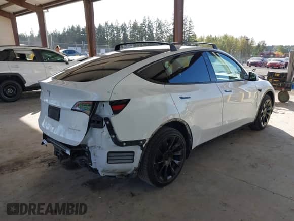 2021 Tesla Model Y Long Range with VIN 5YJYGDEE6MF138868, listed as a IAAI auction lot 43401839 with 134,786 mi miles and . Bid and sale history available at DreamBid. Image 4.