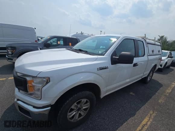 2019 Ford F-150 XL with VIN 1FTEX1EP6KKE99861, listed as a IAAI auction lot 43552263 with 195,197 mi miles and . Bid and sale history available at DreamBid. Image 9.