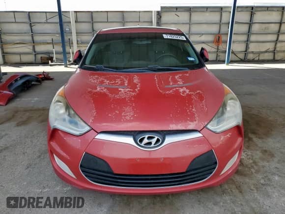 2012 Hyundai Veloster w/Gray Int z VIN KMHTC6AD2CU054207, wystawiony jako Copart lot #71825225 z przebiegiem 177 940 mil mil oraz Szkoda całkowita • Salvage title. Historia ofert i sprzedaży dostępna na DreamBid. Obrazek 5.