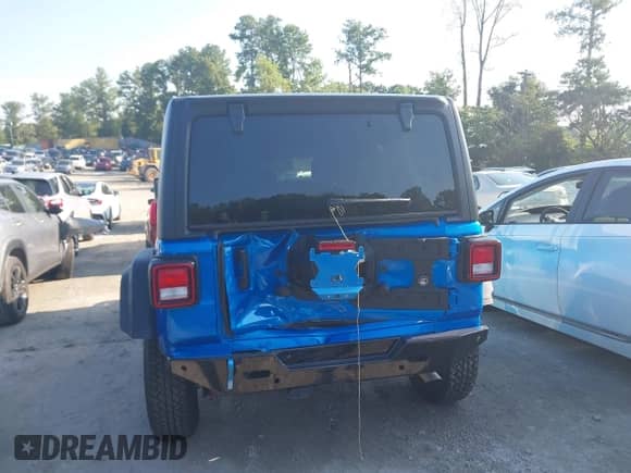 2024 Jeep Wrangler Willys z VIN 1C4RJXDN9RW120392, wystawiony jako IAAI lot #42993840 z przebiegiem 21 060 mil mil oraz . Historia ofert i sprzedaży dostępna na DreamBid. Obrazek 16.