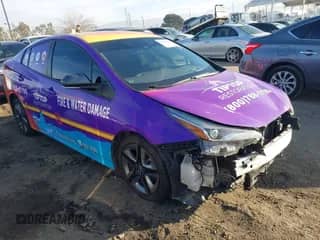 2022 Toyota Prius L Eco with VIN JTDKAMFU2N3154108, listed as a IAAI auction lot 41472013 with Not provided miles and . Bid and sale history available at DreamBid. Image 1.