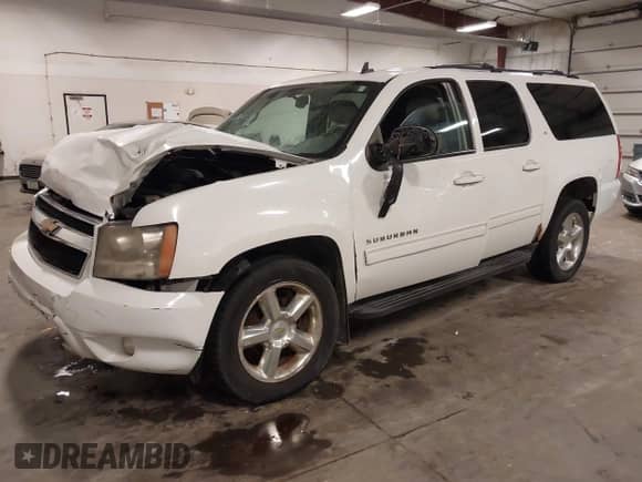 2010 Chevrolet Suburban LT z VIN 1GNUKJE32AR272865, wystawiony jako IAAI lot #43260380 z przebiegiem 167 294 mil mil oraz . Historia ofert i sprzedaży dostępna na DreamBid. Obrazek 2.