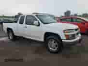 2009 Chevrolet Colorado Work Truck with VIN 1GCCS19E298138682, listed as a Copart auction lot 64776644 with 239,527 mi miles and Salvage title. Bid and sale history available at DreamBid. Image 4.