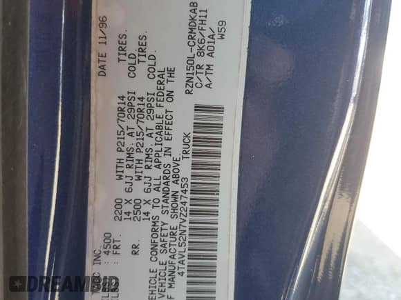 1997 Toyota Tacoma z VIN 4TAVL52N7VZ247453, wystawiony jako Copart lot #82357165 z przebiegiem 105 527 mil mil oraz Szkoda całkowita • Salvage title. Historia ofert i sprzedaży dostępna na DreamBid. Obrazek 12.