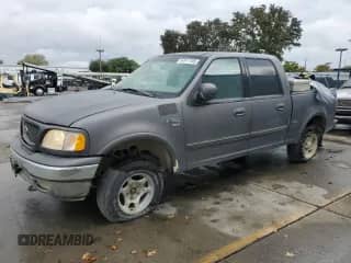 2003 Ford F-150 XLT z VIN 1FTRW08L33KD53247, wystawiony jako Copart lot #84971105 z przebiegiem Nie podano mil oraz Szkoda całkowita • Salvage title. Historia ofert i sprzedaży dostępna na DreamBid. Obrazek 1.