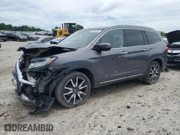 2020 Honda Pilot Elite с VIN 5FNYF6H04LB062774, выставлен на аукционе Copart как лот 60138735 с пробегом 78 510 миль миль и Списание • Salvage title. История ставок и продаж доступна на DreamBid. Изображение 1.