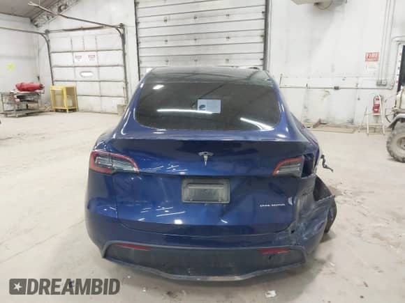 2021 Tesla Model Y Long Range with VIN 5YJYGDEE2MF159264, listed as a IAAI auction lot 43167588 with 83,012 mi miles and . Bid and sale history available at DreamBid. Image 17.