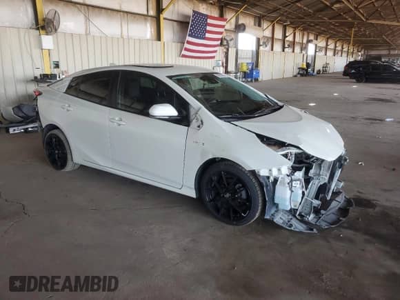 2018 Toyota Prius Two Eco with VIN JTDKARFU3J3552581, listed as a Copart auction lot 60550205 with 114,462 mi miles and Salvage title. Bid and sale history available at DreamBid. Image 4.