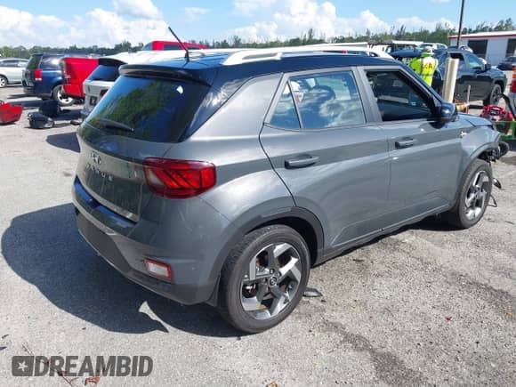 2023 Hyundai Venue Limited with VIN KMHRC8A3XPU275847, listed as a IAAI auction lot 41889404 with 8,555 mi miles and . Bid and sale history available at DreamBid. Image 4.