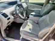 2014 Toyota Prius Three с VIN JTDZN3EU5E3326016, выставлен на аукционе Copart как лот 68001025 с пробегом 148 612 миль миль и Списание • Salvage title. История ставок и продаж доступна на DreamBid. Изображение 7.