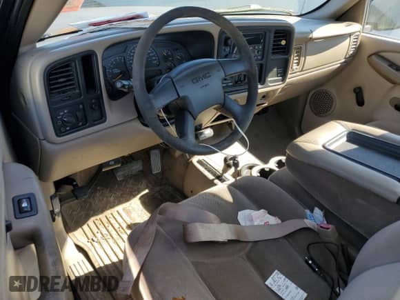 2003 GMC Sierra 1500 SLE z VIN 1GTEK14V63Z298162, wystawiony jako Copart lot #88354465 z przebiegiem Nie podano mil oraz Czysty tytuł • Clean title. Historia ofert i sprzedaży dostępna na DreamBid. Obrazek 8.