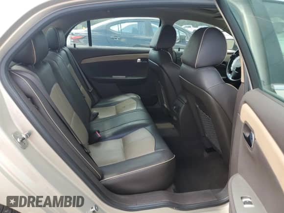 2010 Chevrolet Malibu LTZ with VIN 1G1ZE5EB3AF213774, listed as a Copart auction lot 71156795 with 238,598 mi miles and Salvage title. Bid and sale history available at DreamBid. Image 10.
