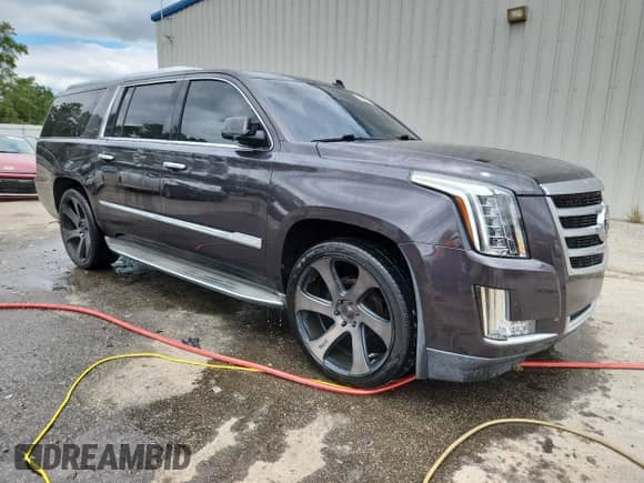 2015 Cadillac Escalade ESV Luxury с VIN 1GYS3HKJ4FR277575, выставлен на аукционе Copart как лот 70989265 с пробегом 231 225 миль миль и Списание • Salvage title. История ставок и продаж доступна на DreamBid. Изображение 4.