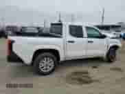 2024 Toyota Tacoma SR with VIN 3TYKD5HN9RT002032, listed as a Copart auction lot 53355655 with 6,144 mi miles and Salvage title. Bid and sale history available at DreamBid. Image 3.