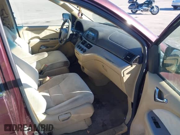 2010 Honda Odyssey LX with VIN 5FNRL3H25AB079528, listed as a IAAI auction lot 43390658 with 242,152 mi miles and . Bid and sale history available at DreamBid. Image 5.