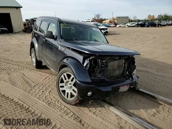 2011 Dodge Nitro Heat с VIN 1D4PU4GX1BW514326, выставлен на аукционе Copart как лот 76665834 с пробегом 128 625 миль миль и Чистый • Clean title. История ставок и продаж доступна на DreamBid. Изображение 11.