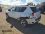 2011 Jeep Compass Latitude with VIN 1J4NF1FB7BD155055, listed as a Copart auction lot 82468995 with 202,863 mi miles and Salvage title. Bid and sale history available at DreamBid. Image 2.