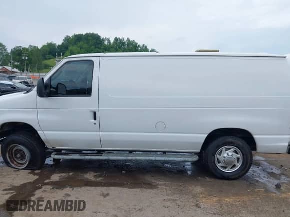 2013 Ford Econoline Cargo Commercial with VIN 1FTNE2EW6DDA36192, listed as a IAAI auction lot 42436255 with 206,784 mi miles and . Bid and sale history available at DreamBid. Image 15.