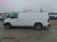 2013 Ford Econoline Cargo Commercial with VIN 1FTNE1EW8DDA38309, listed as a IAAI auction lot 43395449 with 252,665 mi miles and . Bid and sale history available at DreamBid. Image 14.