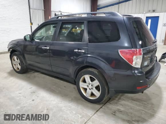 2009 Subaru Forester X z VIN JF2SH63619G790712, wystawiony jako Copart lot #52878055 z przebiegiem 91 290 mil mil oraz Szkoda całkowita • Salvage title. Historia ofert i sprzedaży dostępna na DreamBid. Obrazek 2.